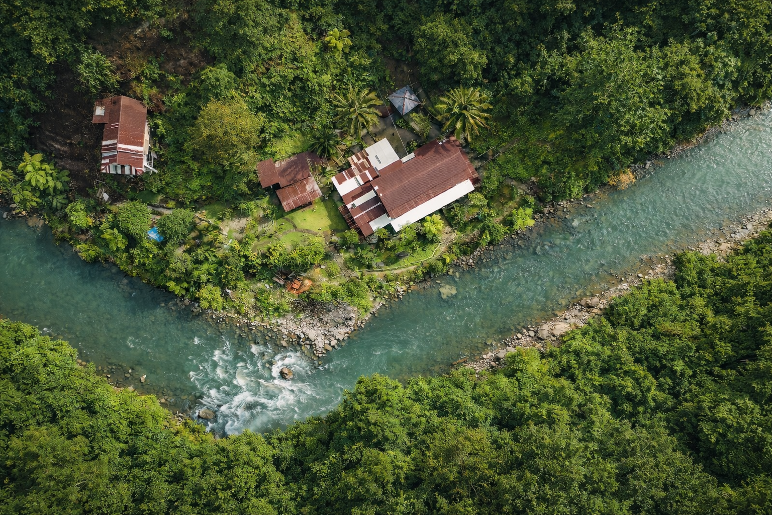 Aerial view of Back to Nature Eco-Lodge beside the Bohorok River