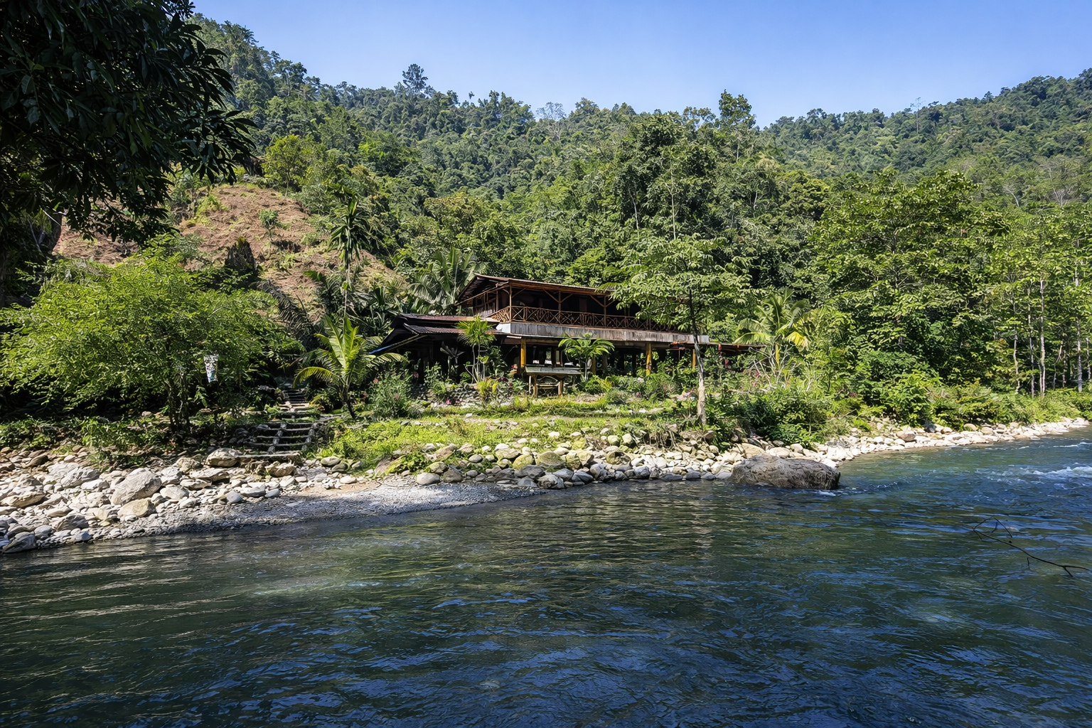 Back to Nature Ecotourism lodge beside the clear Bohorok River in Bukit Lawang